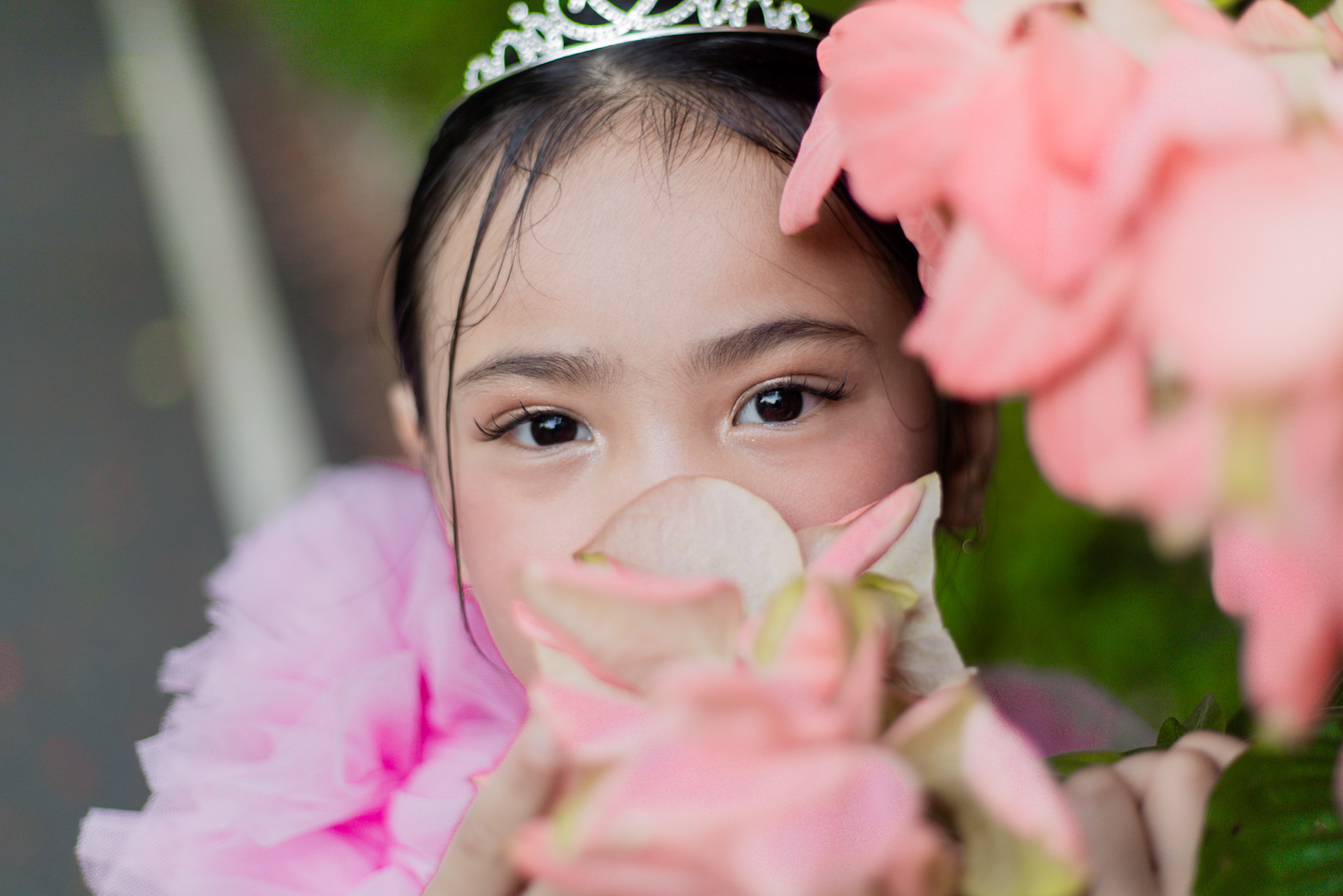 Stylish portrait of a woman with soft natural lighting in an urban setting with blurred cityscape background